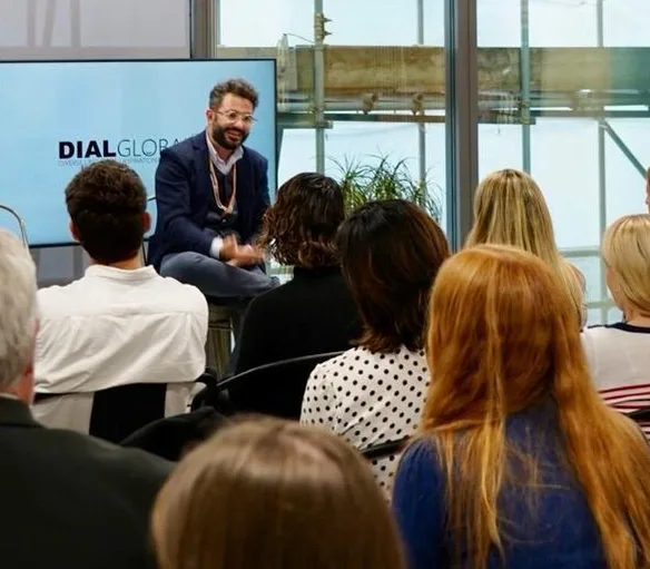 Antonio Bebba in conversation on stage in front of an audience at DIAL Global London.